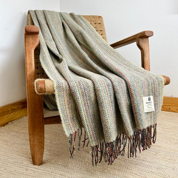 Pure Wool Throw – Lichen Tweed - McNutt of Donegal - on chair